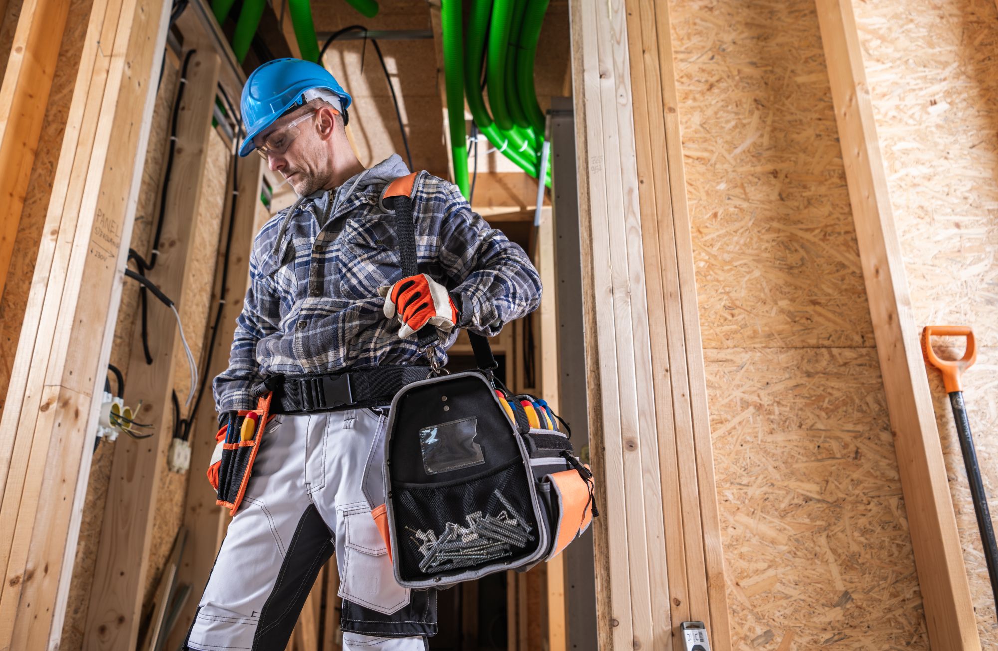 Construction worker organising his tools